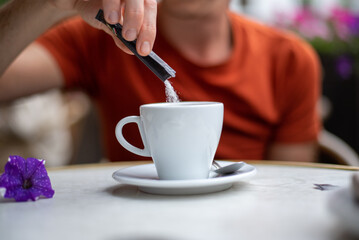 person with cup of coffee