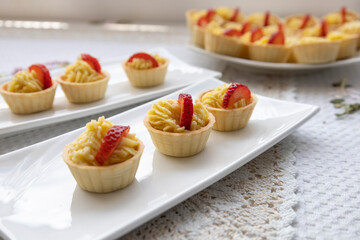 appetizing cupcakes with pastry cream and strawberry, delicious sweet dessert, cooking and hobbies in studio, wallpaper