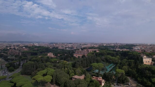 DRONE AERIAL FOOTAGE - Aerial view of the Colosseum in Rome, Italy. The ancient Roman Colosseum is one of the main tourist attractions in Europe.