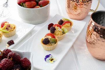 cake decorated with fruits and glass with drink, delicious pastry lifestyle and wallpaper, appetizing gourmet food, texture details