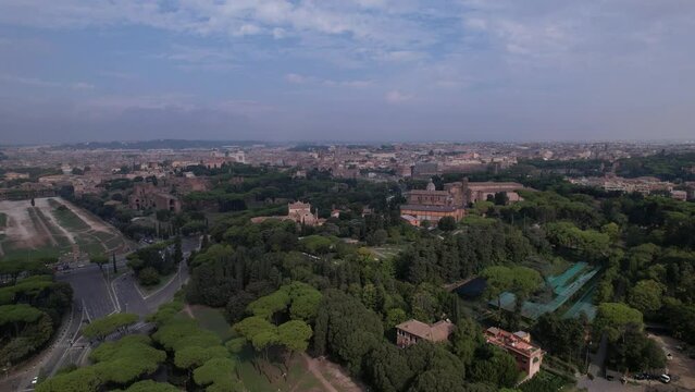 DRONE AERIAL FOOTAGE - The Circus Maximus (Circo Massimo), an ancient Roman chariot-racing stadium and the Colosseum in Rome, Italy.