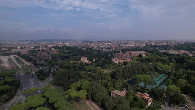 DRONE AERIAL FOOTAGE - The Circus Maximus (Circo Massimo), an ancient Roman chariot-racing stadium and the Colosseum in Rome, Italy.