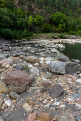 mountain river, sources in the canyon of the stone bed, panorama of the area,