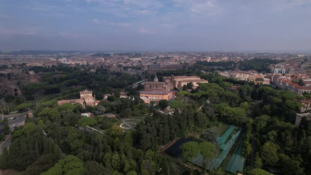 DRONE AERIAL FOOTAGE - Aerial view of the Colosseum in Rome, Italy. The ancient Roman Colosseum is one of the main tourist attractions in Europe.