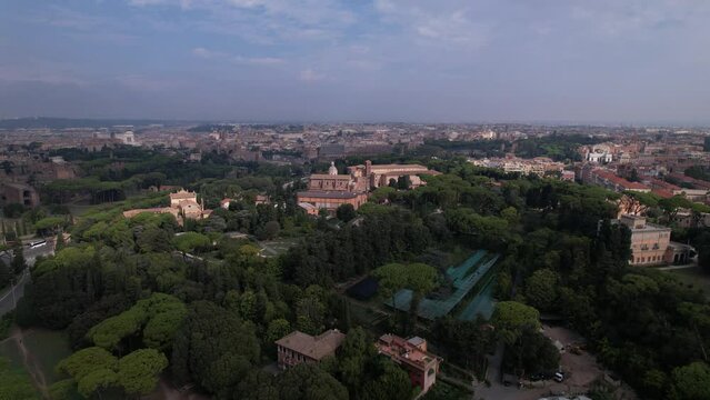 DRONE AERIAL FOOTAGE - Aerial view of the Colosseum in Rome, Italy. The ancient Roman Colosseum is one of the main tourist attractions in Europe.
