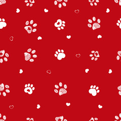 Red background with white paw prints seamless fabric design pattern