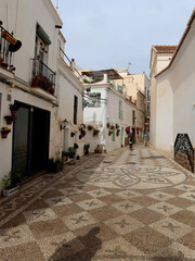 Fototapeta na wymiar Tiled streets of Spanish resort town Nerja