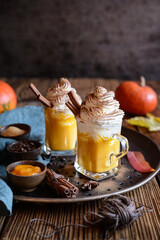 Pumpkin spice latte topped with whipped cream