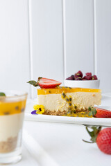 exquisite pastry ready to be served on a table, piece of beautiful cheesecake, studio with sweet food as wallpaper