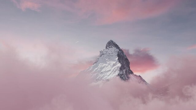 view to the majestic Matterhorn mountain in the evening pink mood