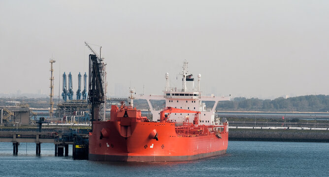 Port of Rotterdam, Netherlands - 09 24 2022: Front view of shuttle tanker during cargo operations in the European port