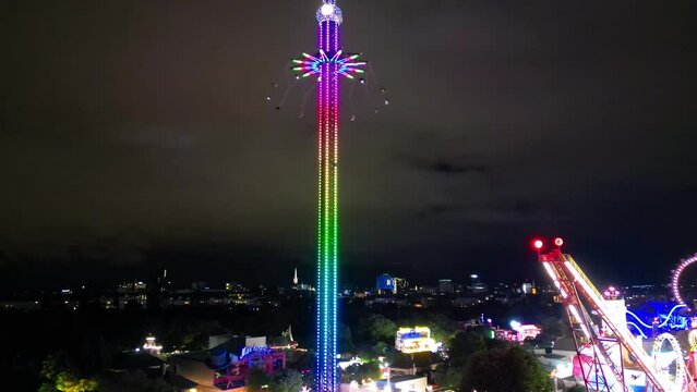 Vienna, Austria. Aerial view of Prater Park night lights. Amusement city park on a summer night from drone