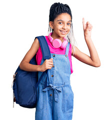 Cute african american girl holding student backpack using backpack surprised with an idea or...