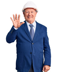 Senior handsome grey-haired man wearing suit and architect hardhat showing and pointing up with fingers number five while smiling confident and happy.