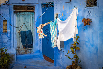 laundry drying on the clothesline, blue city of Chefchaouen, morocco, north africa