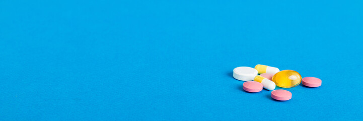 Many different colorful medication and pills perspective view. Set of many pills on colored background