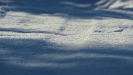 Picturesque snow surface sunlight wintertime close up. Winter landscape.