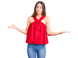 Beautiful brunette young woman wearing casual clothes clueless and confused expression with arms and hands raised. doubt concept.