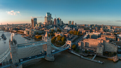 Obraz premium Aerial view of the London Tower Bridge at sunset. Sunset with beautiful clouds over London - the capital of Britain.