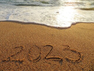 inscription on the sand 2023 New Year