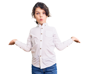 Cute hispanic child wearing casual clothes clueless and confused expression with arms and hands raised. doubt concept.