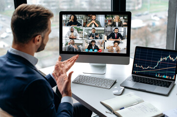 Confident successful businessman, company boss, stock investor, having financial brainstorm with group of multiracial people by video conference, discuss investments in the stock market, risks - obrazy, fototapety, plakaty