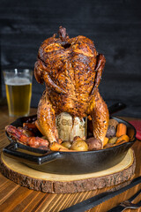 Beer can chicken with roasted vegetables - 539874413