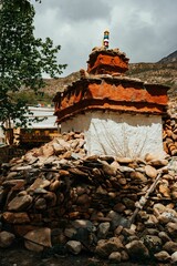 Vertical shot of the historic Tibetan Buddhist holy site Ghar Gumba Monastery in the Himalayas