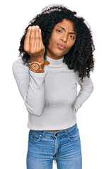 Young african american girl wearing casual clothes doing italian gesture with hand and fingers confident expression