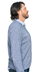 Middle age handsome man wearing casual clothes looking to side, relax profile pose with natural...