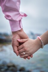 couple holding hands