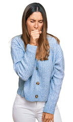 Young woman wearing casual clothes feeling unwell and coughing as symptom for cold or bronchitis. health care concept.