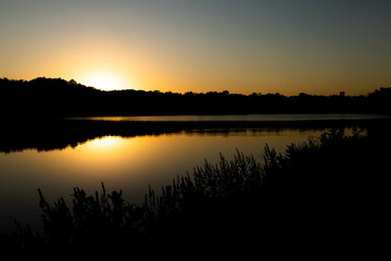 Obraz premium sunset over the river