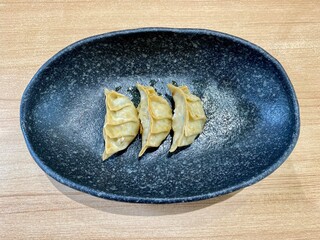Plate with gyozas