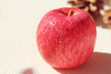 red apple on a wooden background