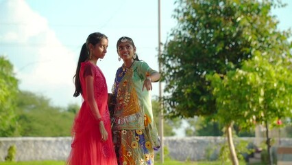 Portrait of beautiful indian girl. Young hindu woman model. Traditional India costume lehenga choli for Navaratri. young beautiful indian girl on green background