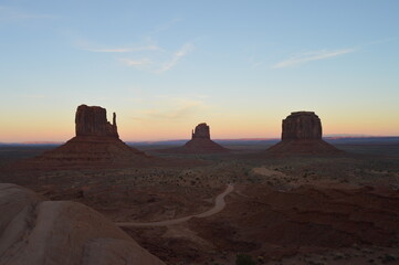 Sunset over the East and West Mitten Buttes at Monument Valley, Utah