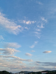 cloud and vanilla sky background with dark mountain silhouette