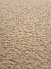 Naklejka na ściany i meble closeup of sand pattern of a beach in the summer