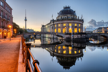 Fototapeta na wymiar The river Spree in Berlin before sunrise with the Bode-Museum and the Television Tower