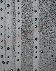 Water drops on a black background close-up