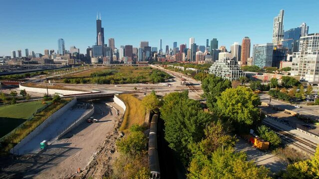 Subway Train Traveling Through Tunnel With Chicago Skyline Drone Footage