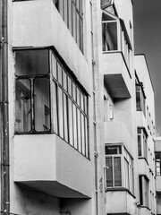 BW facade of avant-garde minimalist house with balconies. Detailed picture of exterior urban...