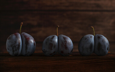 double original large plum on a wooden background