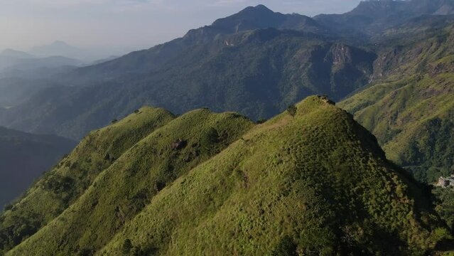 A drone shot of Adam Peak mountain view in Sri Lanka in the morning. An amazing mountain view