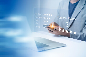 Satisfaction and customer service survey concept, business people using  laptop and smartphone. to...