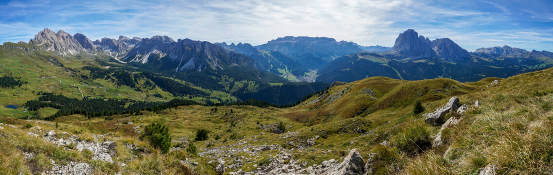 Awesome panoramic mountain view in the dolomites: Distinctive Sassolungo mountain group at gardena valley in south tyrol. View from Piz Pic mountain to sella group and Alp di Siusi. Nature concept