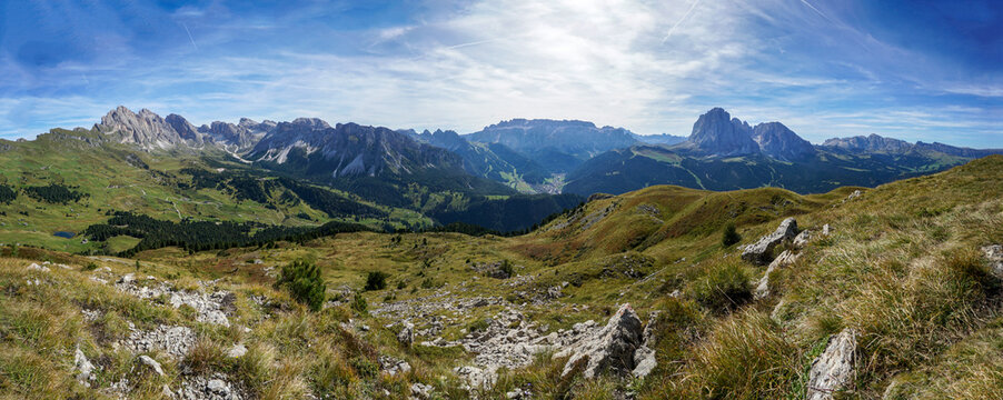 Amazing panoramic mountain view in the dolomites: Distinctive Sassolungo mountain group at gardena valley in south tyrol. View from Piz Pic mountain to sella group, gardena valley and Alp di Siusi