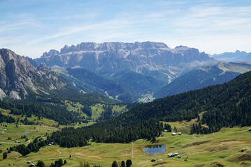 Fototapeta na wymiar Amazing view to distinctive mountain Sella Group in the Dolomites: Distinctive and famous mountain ridge in south tyrol, gardena valley, italy.