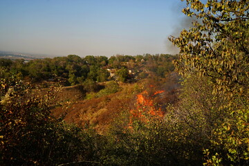 Fires in mountainous areas. Ignition of dry grass, shrubs and trees.